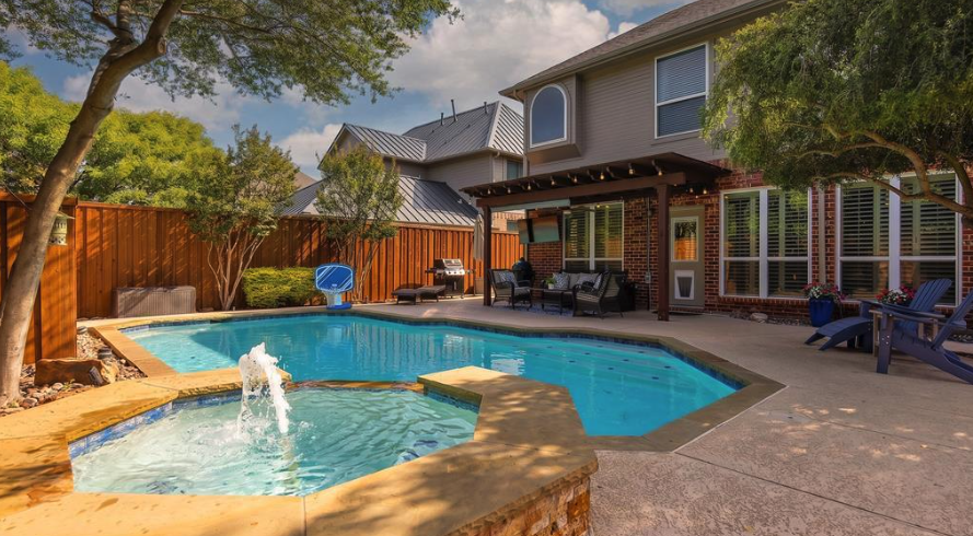 Pool and backyard at 2805 Harkness Drive in Plano, Texas
