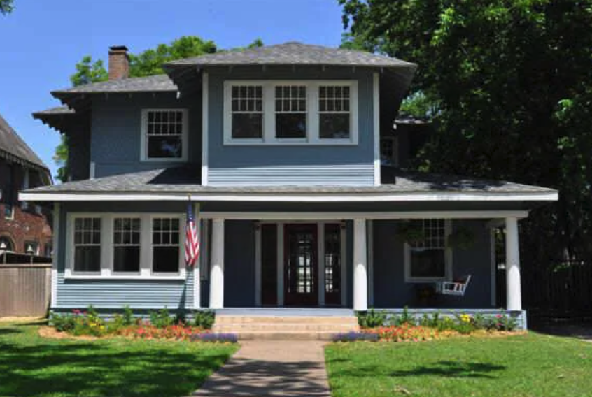 Front exterior of the two-story home at 5211 Junius in Dallas